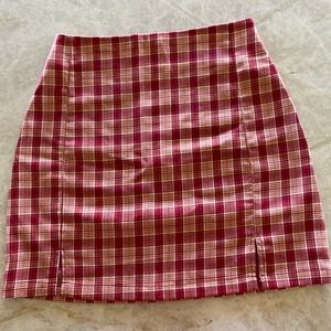 John Galt California miniskirt. One size. Zips up from the back. Two front slits